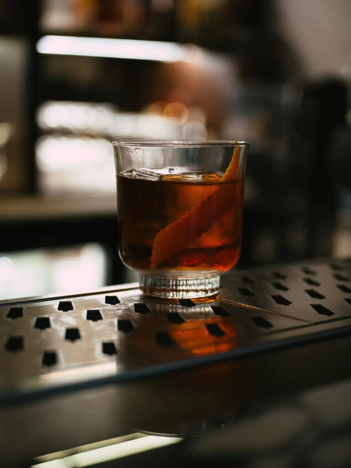 Old Fashioned cocktail with orange peel